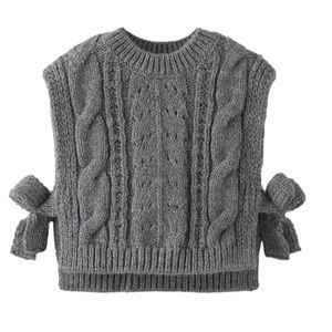 Baby knit vest . Cover all . Ties on the sides . Brand new